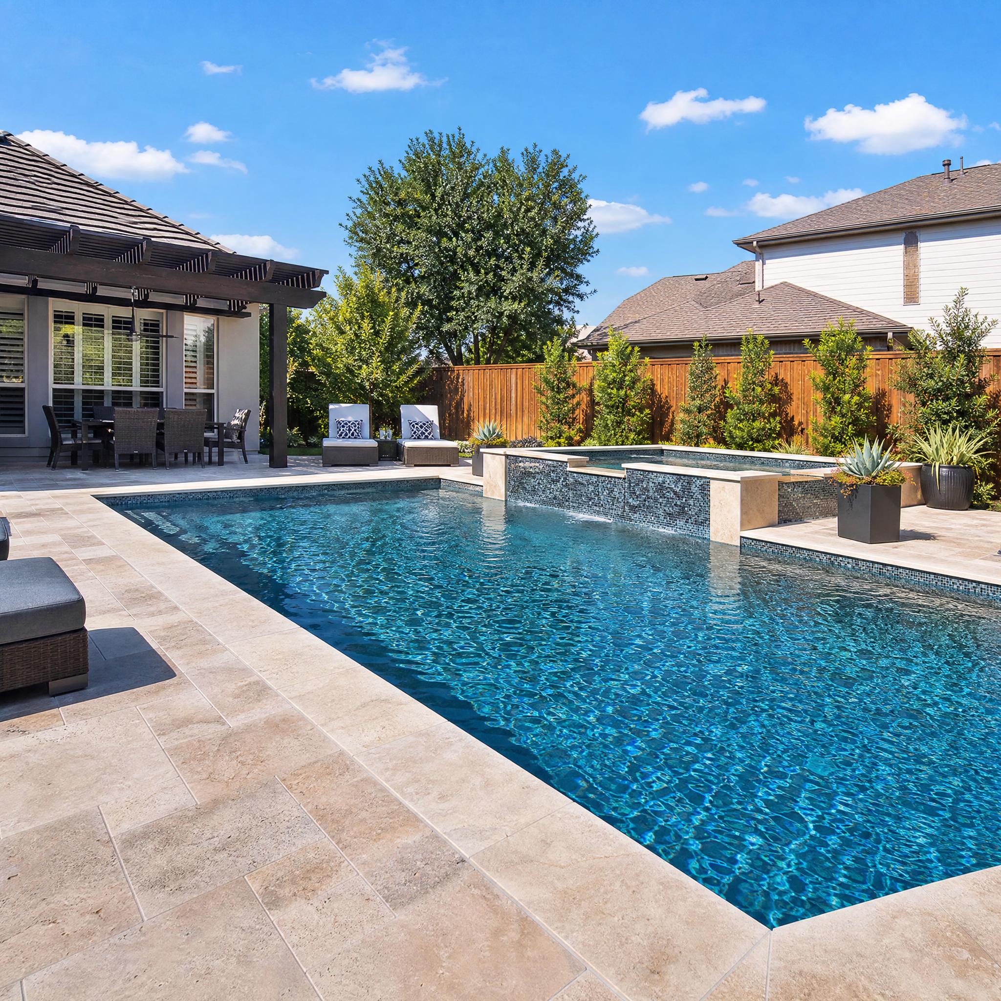 Rectangular pool with raised spa and pergola